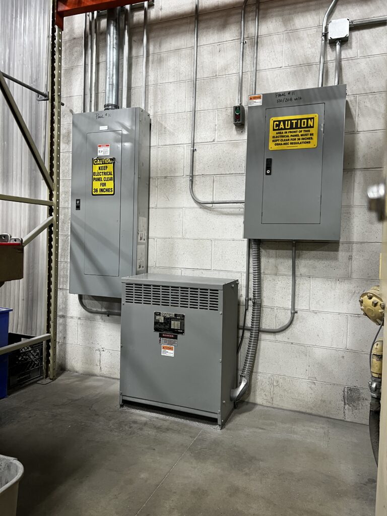 industrial electrical panel with breakers and control wiring